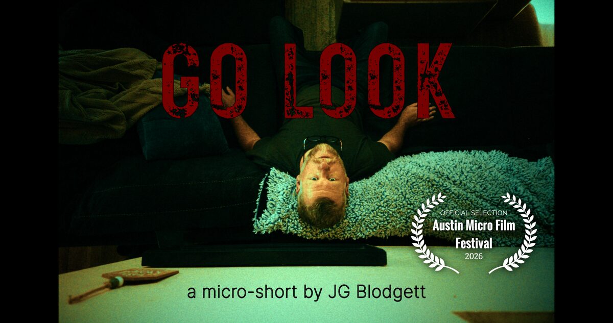 Man lying on couch upside down - Go Look Key Art